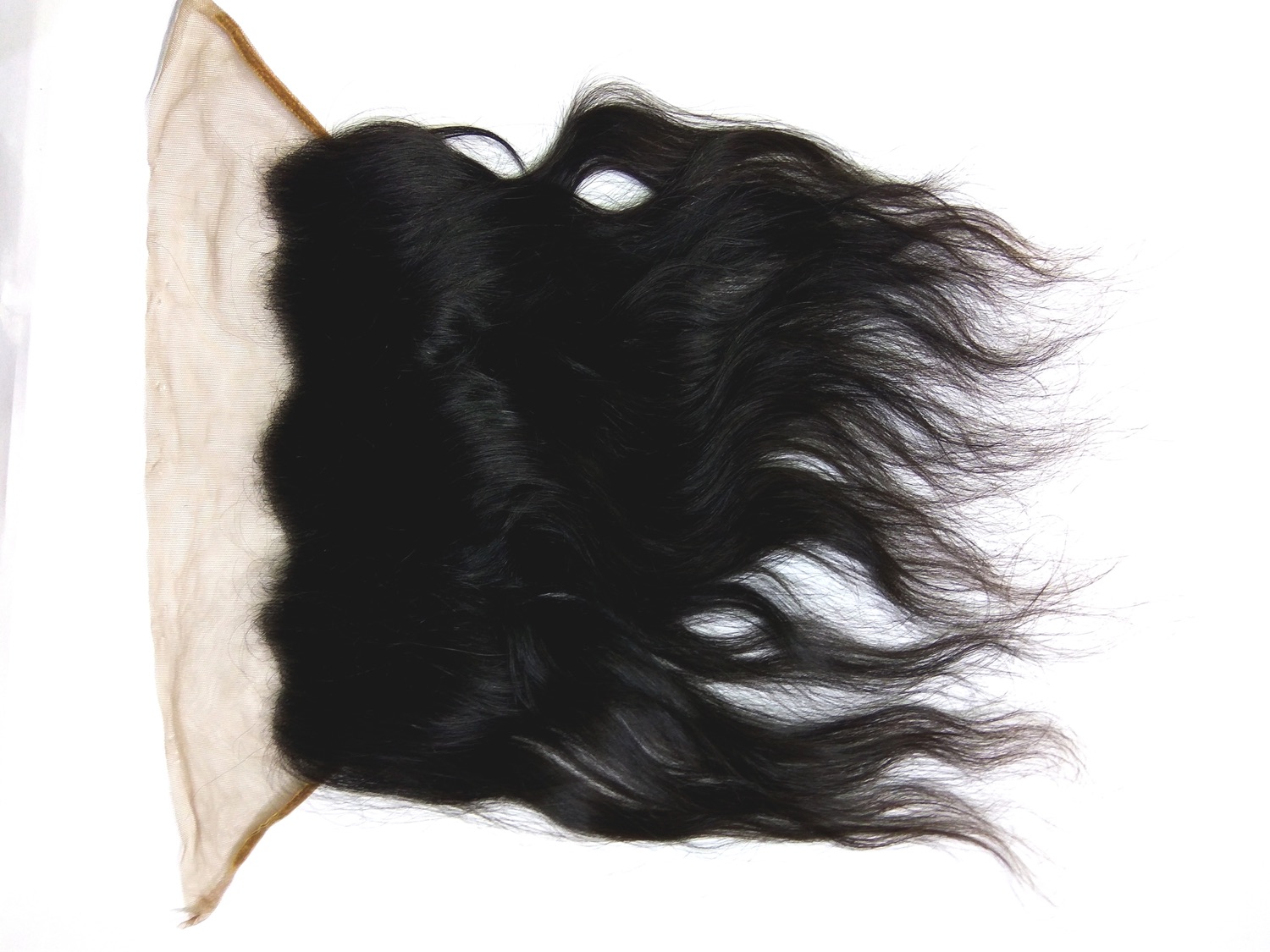 Juttu Extensions lace frontal at angle — natural black wavy virgin Remy